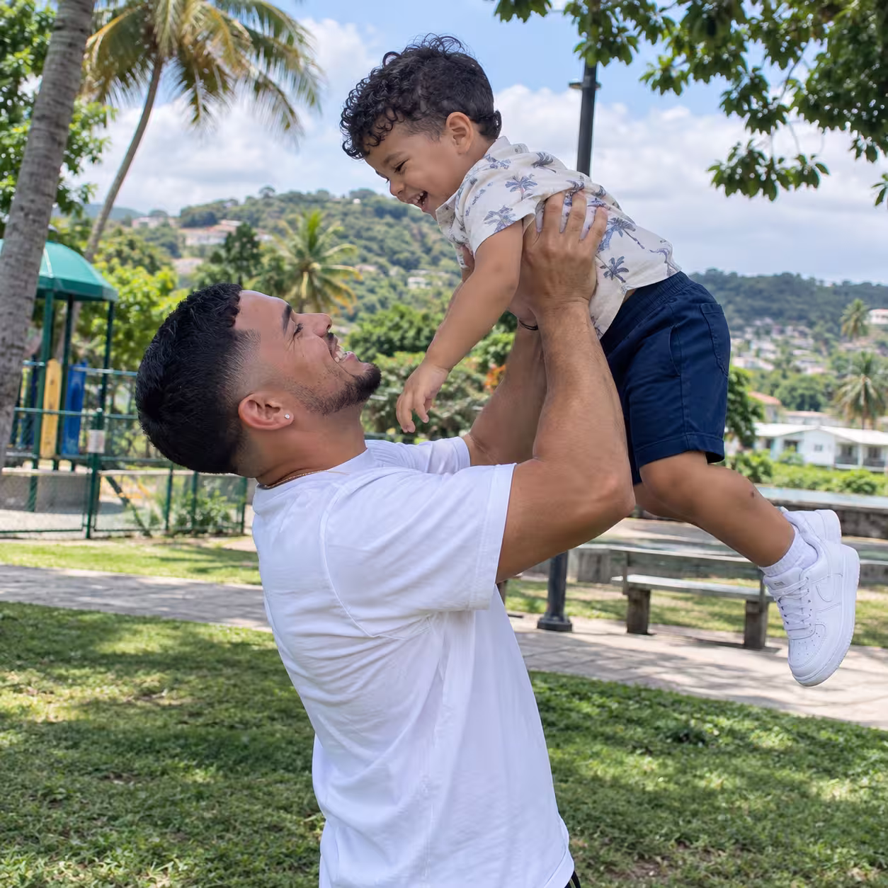 Joyful Lift in a Tropical Park